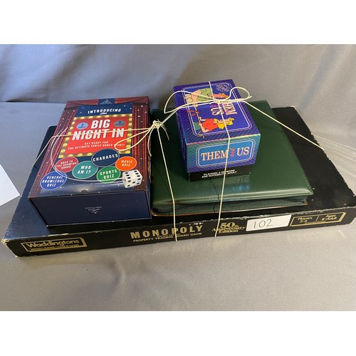 102 - Selection of games including anniversary edition monopoly and travel scrabble