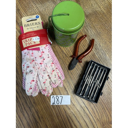 287 - Unused trio pack of gardening gloves & other items