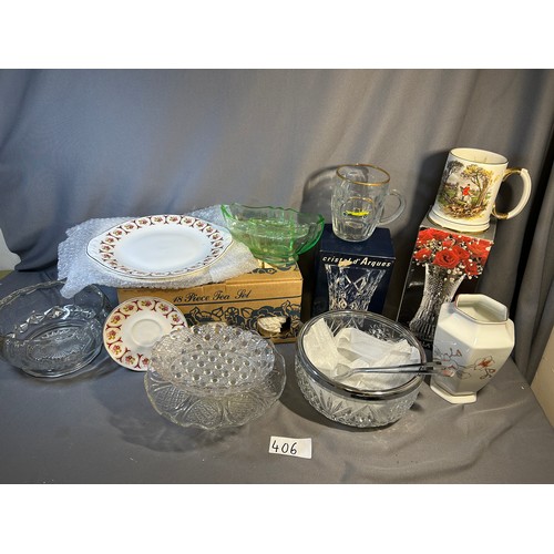 406 - Selection of glass and china - to include vases and tea set