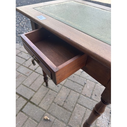 814 - Green leather topped side table with drawer - 110 x 51x 37cm approx.