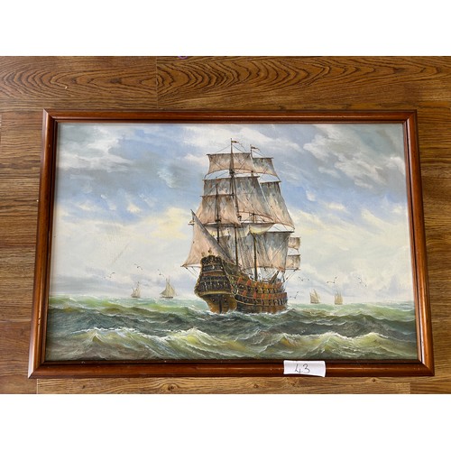 43 - Large ship at sea canvas  signed 'F Daniels' - 69cms x 99cms (approx.)