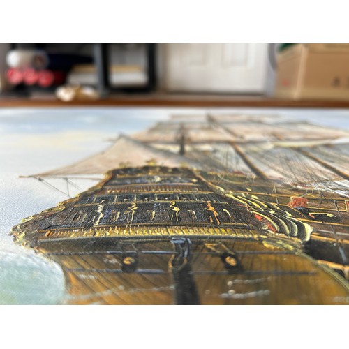 43 - Large ship at sea canvas  signed 'F Daniels' - 69cms x 99cms (approx.)