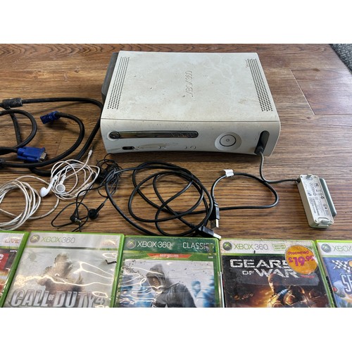 1095 - Xbox 360 (missing cables), Xbox Games and controller + 2 x earphones + misc. cables