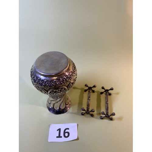 16 - Ornate white metal vase and pair of knife rests