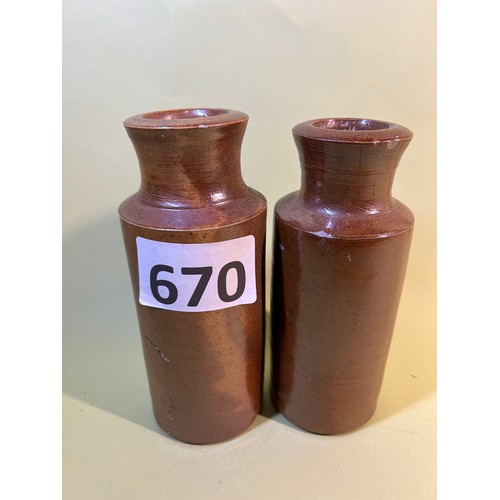 670 - Set of two small flagon type ceramic pots