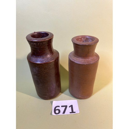 671 - Set of two small flagon style ceramic pots