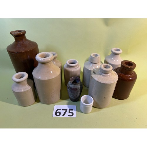 675 - 11 x various sized flagon type ceramic pots