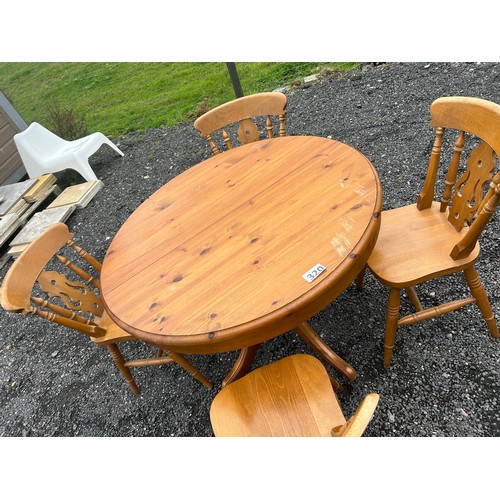 320 - Round pine dining table and 4 chairs