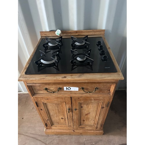 10 - Freestanding kitchen pine unit with gas hob and storage under