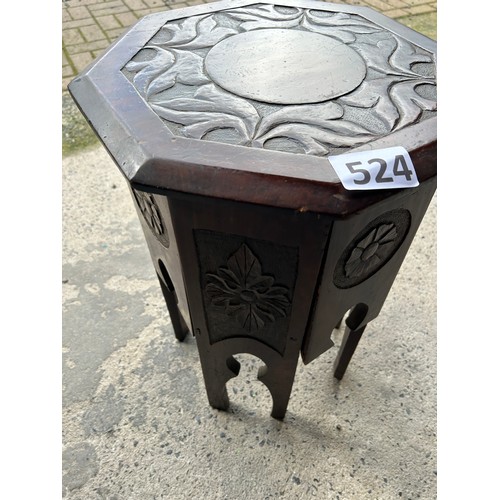 524 - Oriental style octagonal table 55cms (H) x 40cms diameter approx.