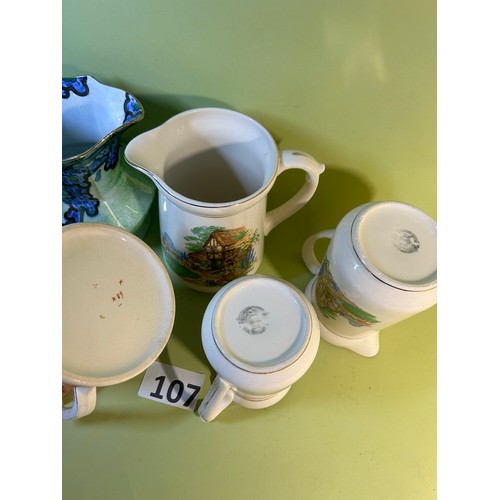 107 - Trio of 'A Midsummers day' jugs and 2 collectable jugs