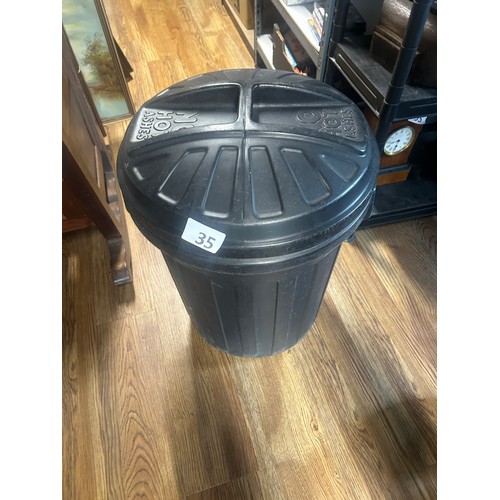 35 - Black waste bin