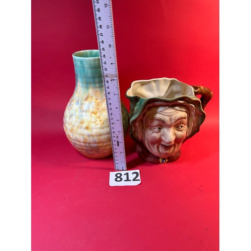 812 - Ceramic character jug and vase