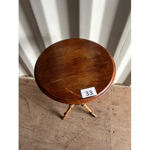 33 - Tripod based circular occasional table - 74cms  x 42cms approx.