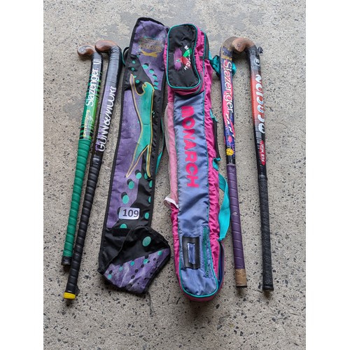 109 - 4 x hockey sticks and bags