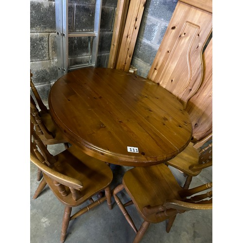 111 - Pine extending dining table (110cm approx diameter when not extended) and 4 x chairs