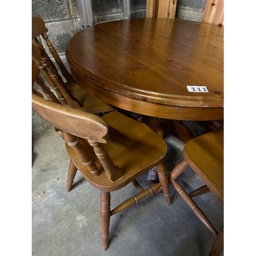 111 - Pine extending dining table (110cm approx diameter when not extended) and 4 x chairs