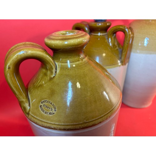 492 - 3 x stoneware flagons with handles - 33cms tall approx.