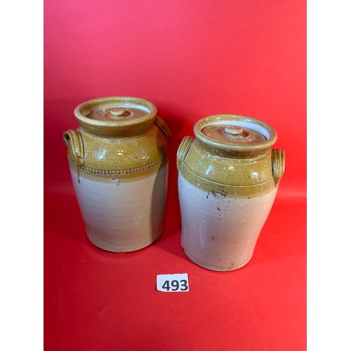 493 - 2 x stoneware storage jars with lids - 32cms tall approx.