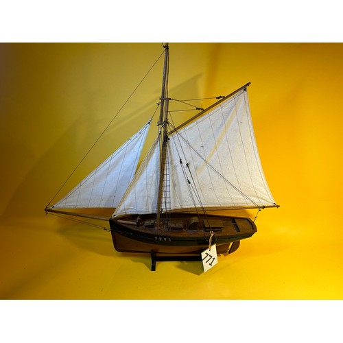 771 - Wooden model ship on stand - 70cm max length