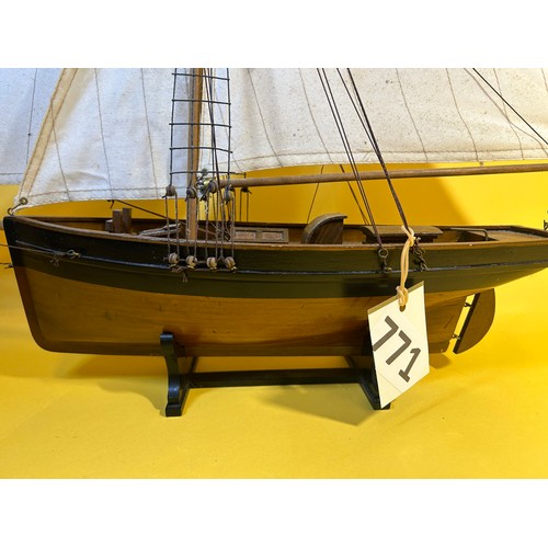 771 - Wooden model ship on stand - 70cm max length