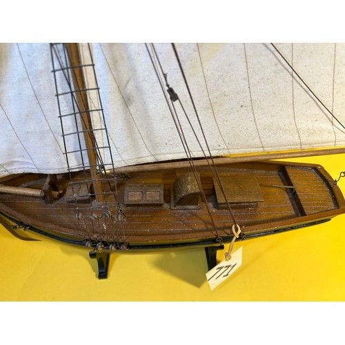 771 - Wooden model ship on stand - 70cm max length