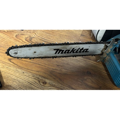 138 - Makita chainsaw & oil with bag