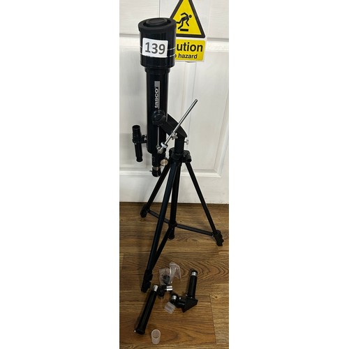 139 - Tasco telescope and tripod stand