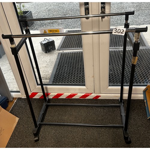 302 - Double clothing rail 80cms wide approx. Adjustable height