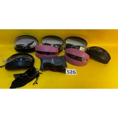 526 - Large selection of sunglasses