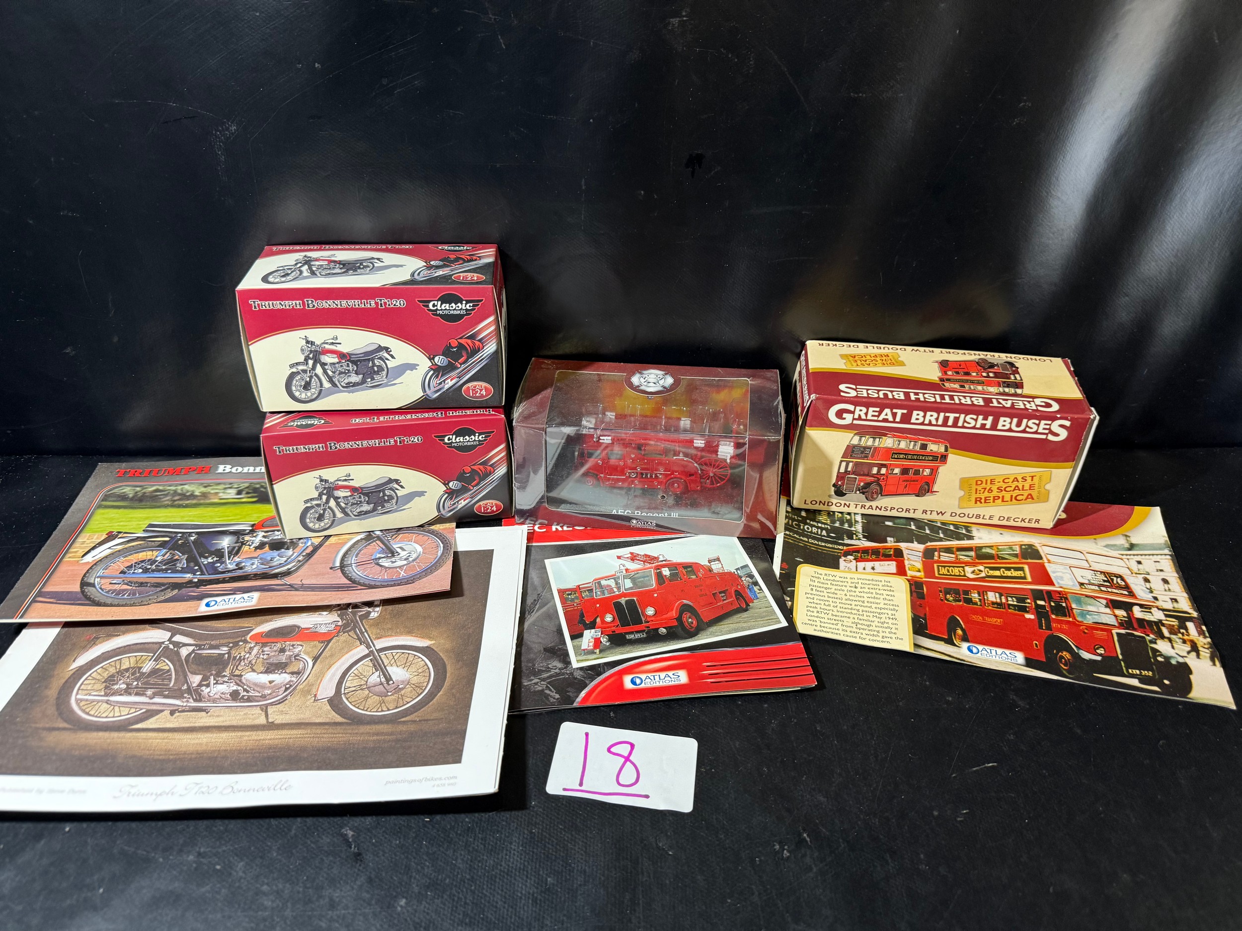 A mixed group of die-cast collectables including: • Two boxed Triumph ...