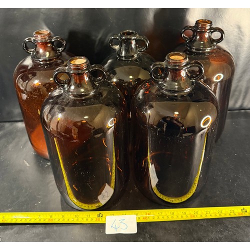 43 - Six Amber Glass Demi-Johns