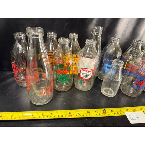 47 - Large mixed collection of vintage glass milk and dairy bottles with printed advertising, including K... 