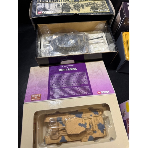 10 - A collection of boxed Corgi World War II military vehicle models, including examples from “Unsung He... 