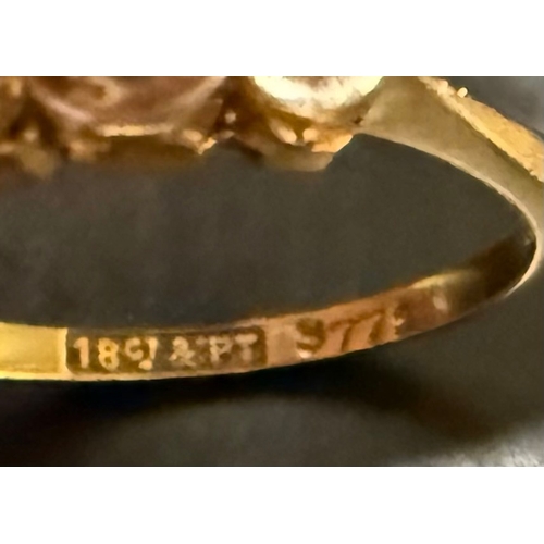 12 - 18ct yellow gold and platinum three stone ring, stamped “18CT & PT”. Approximate weight 1.61g (S... 