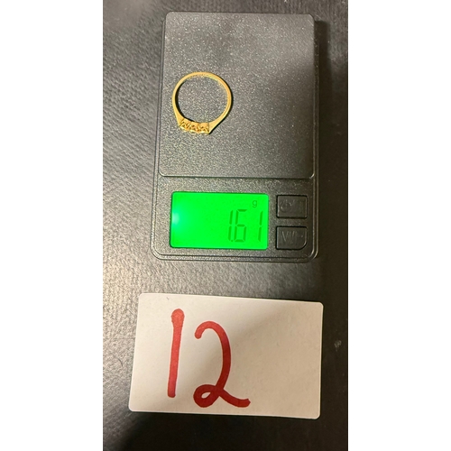 12 - 18ct yellow gold and platinum three stone ring, stamped “18CT & PT”. Approximate weight 1.61g (S... 