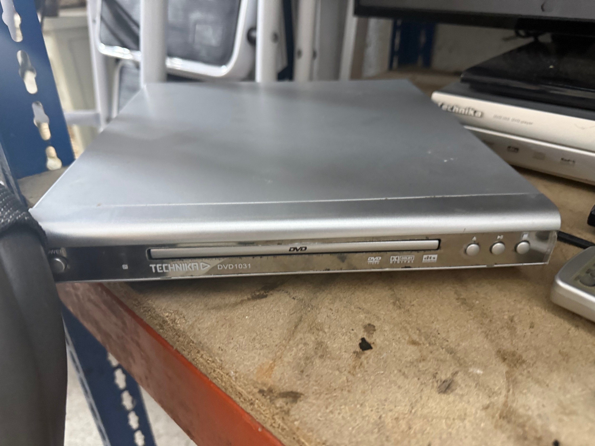 Sharp Aquos flat-screen television together with two Technika DVD ...
