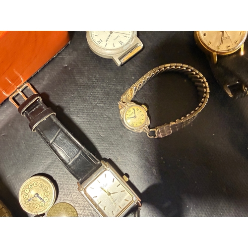 5 - A mixed collection of wristwatches to include examples by Timex, Excalibur, and other makers, togeth... 