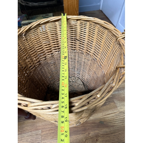 69 - Large wicker log / laundry basket on castors