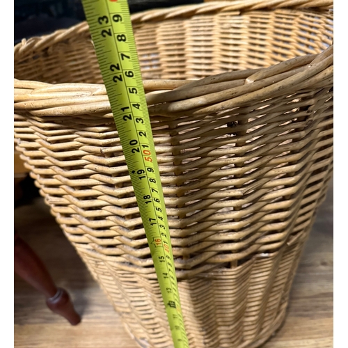 69 - Large wicker log / laundry basket on castors