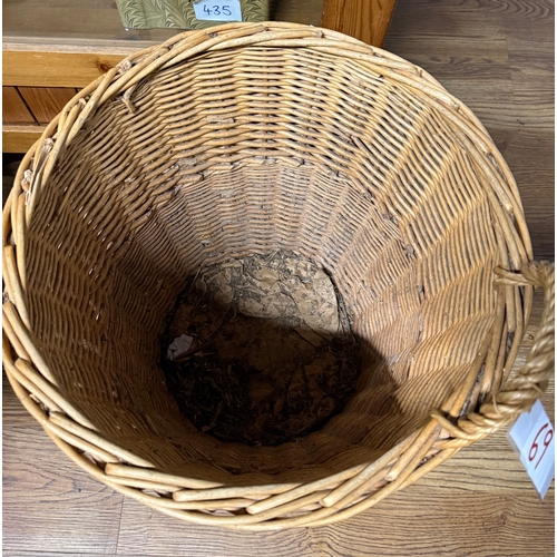 69 - Large wicker log / laundry basket on castors