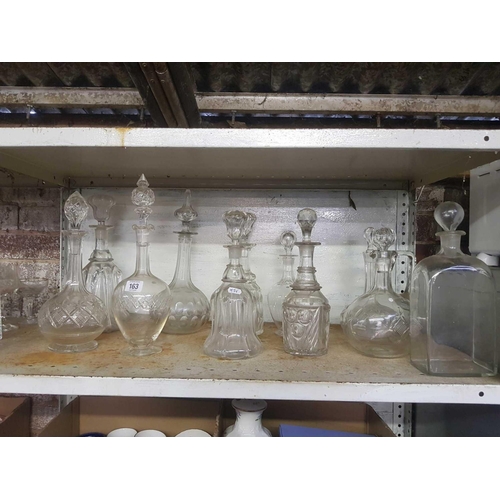 163 - SHELF OF MISC GLASS DECANTERS