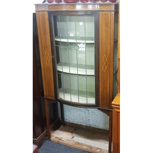 187 - INLAID MAHOGANY BOW FRONTED LEADED GLASS DOOR DISPLAY CABINET ON LEGS