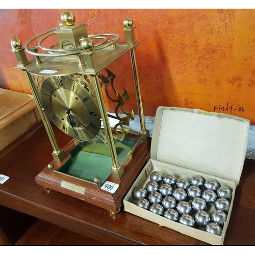 400 - SPHERICAL WEIGHT CLOCK