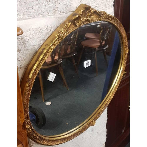 410 - GILT FRAMED OVAL MIRROR