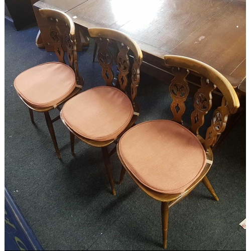 423 - ERCOL OLD COLONIAL EXTENDING DINNING TABLE WITH 6 CHAIRS