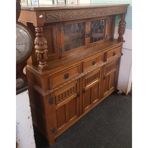 438 - A LEADED GLASS COURT CUPBOARD