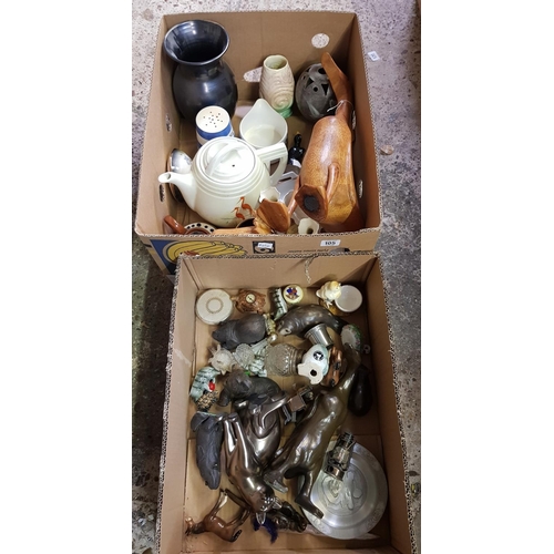 105 - 2 CARTONS OF MIXED BRIC-A-BRAC INCL: TEA POTS, VASES, 2 WOODEN DUCKS, A BRONZE RESIN DUCK & OTHER BR... 