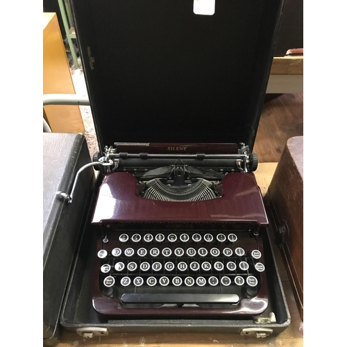 107 - CASED CORONA SILENT TYPEWRITER IN GOOD CONDITION