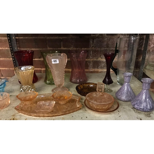 185 - SHELF OF COLOURED GLASSWARE INCL; VASES, DRESSING TABLE SET & JUG